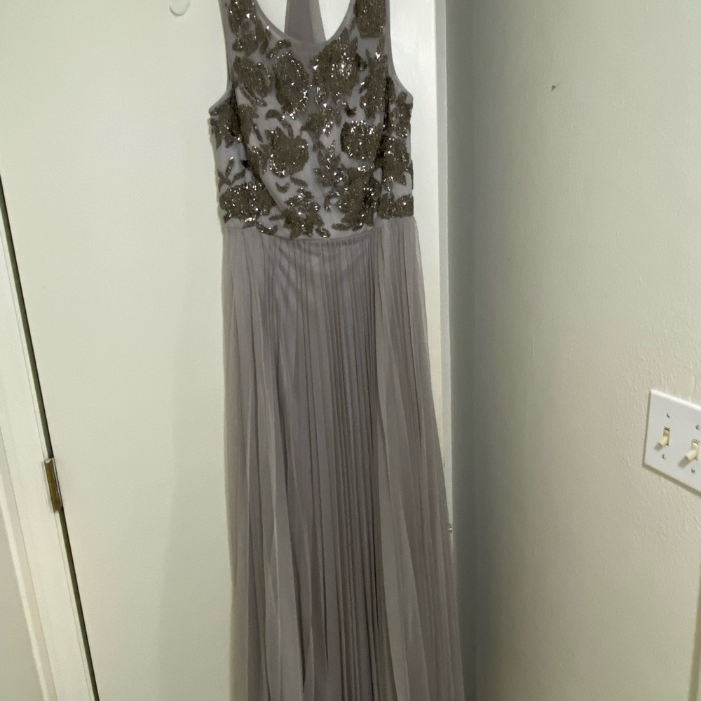Exquisitely beaded sleeveless gray gown